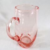 Antique pitcher made of blown glass
