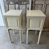 Pair of Louis XVI style bedside tables in white lacquered wood