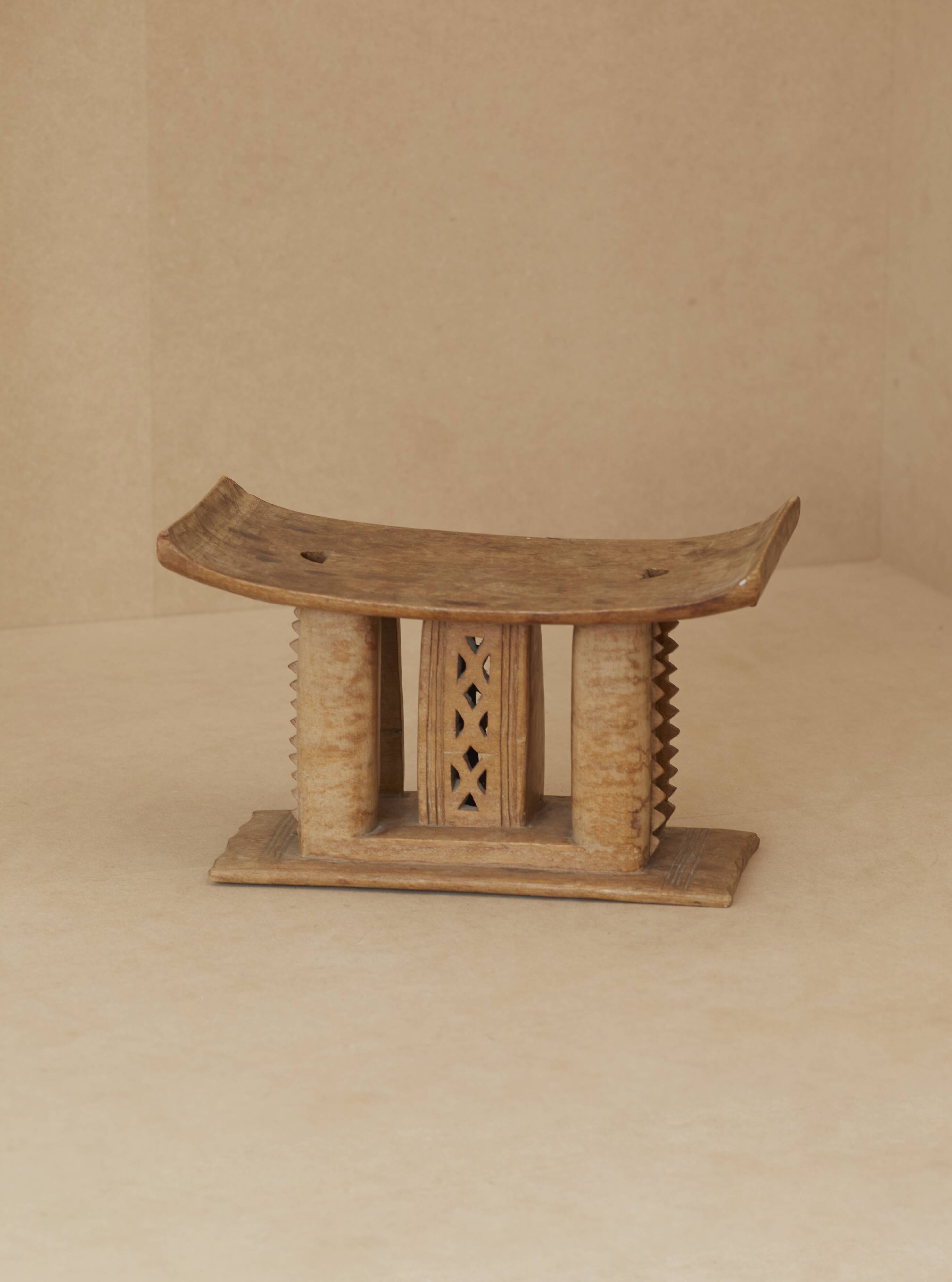 African Ashanti monoxyl stool in solid wood circa 1950