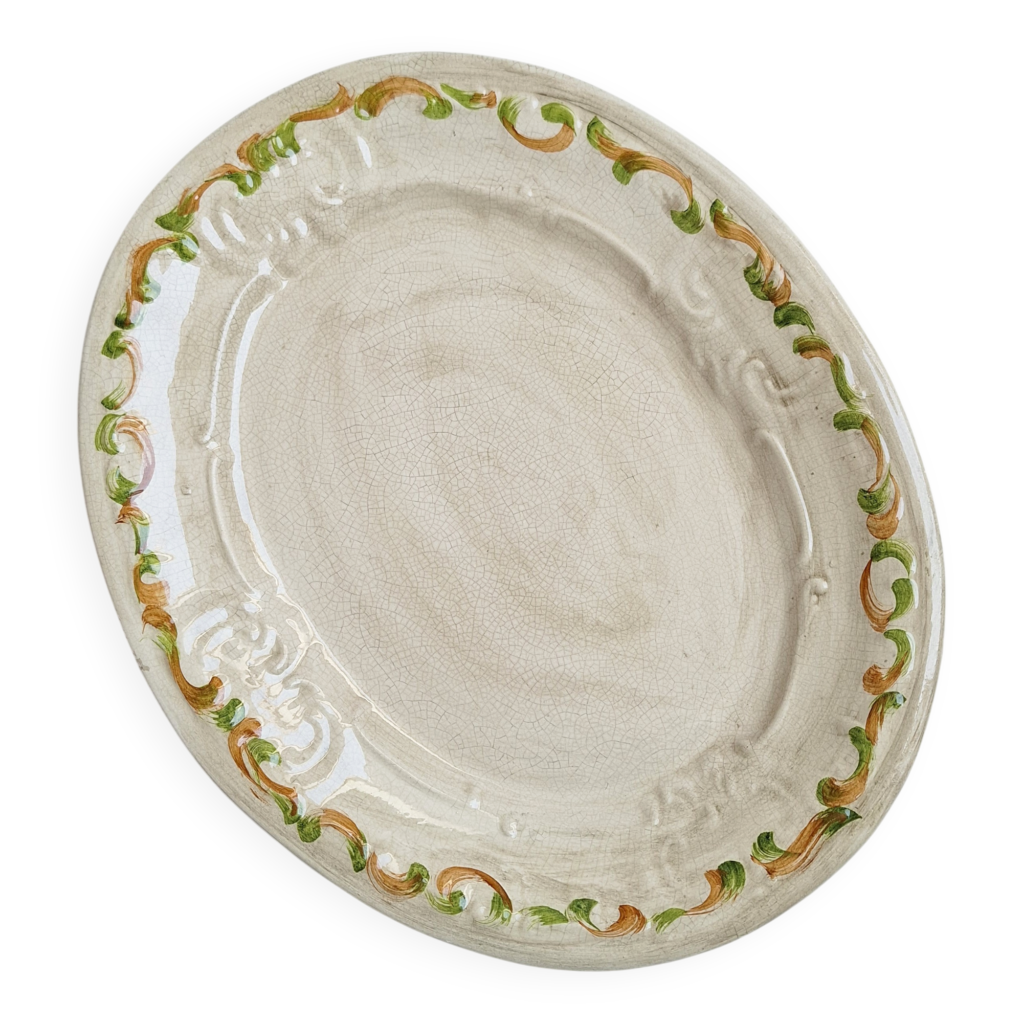 Oval plate, hand-painted meat platter in orange and green.