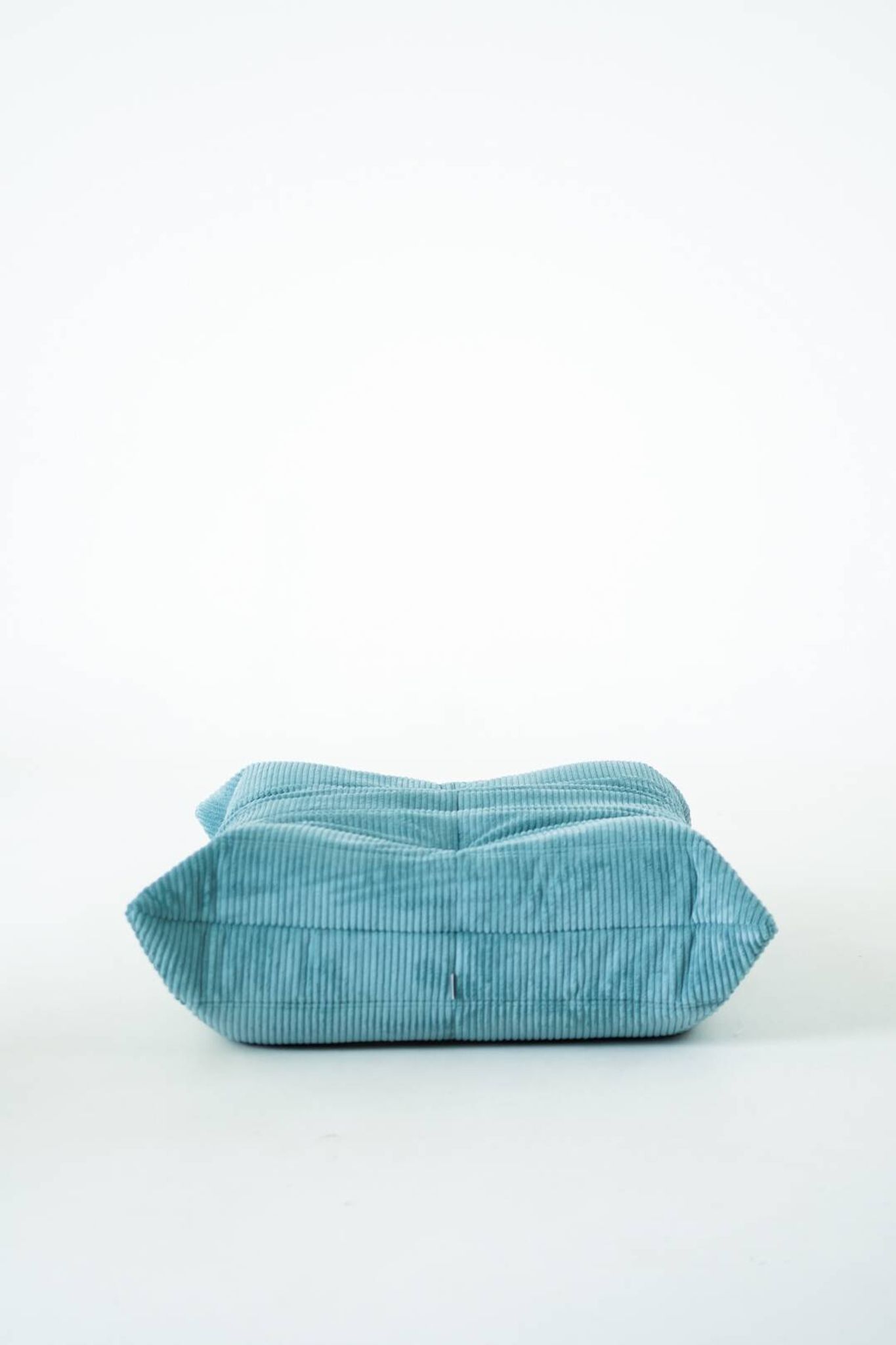 Togo set of armchair and pouf in light blue corduroy