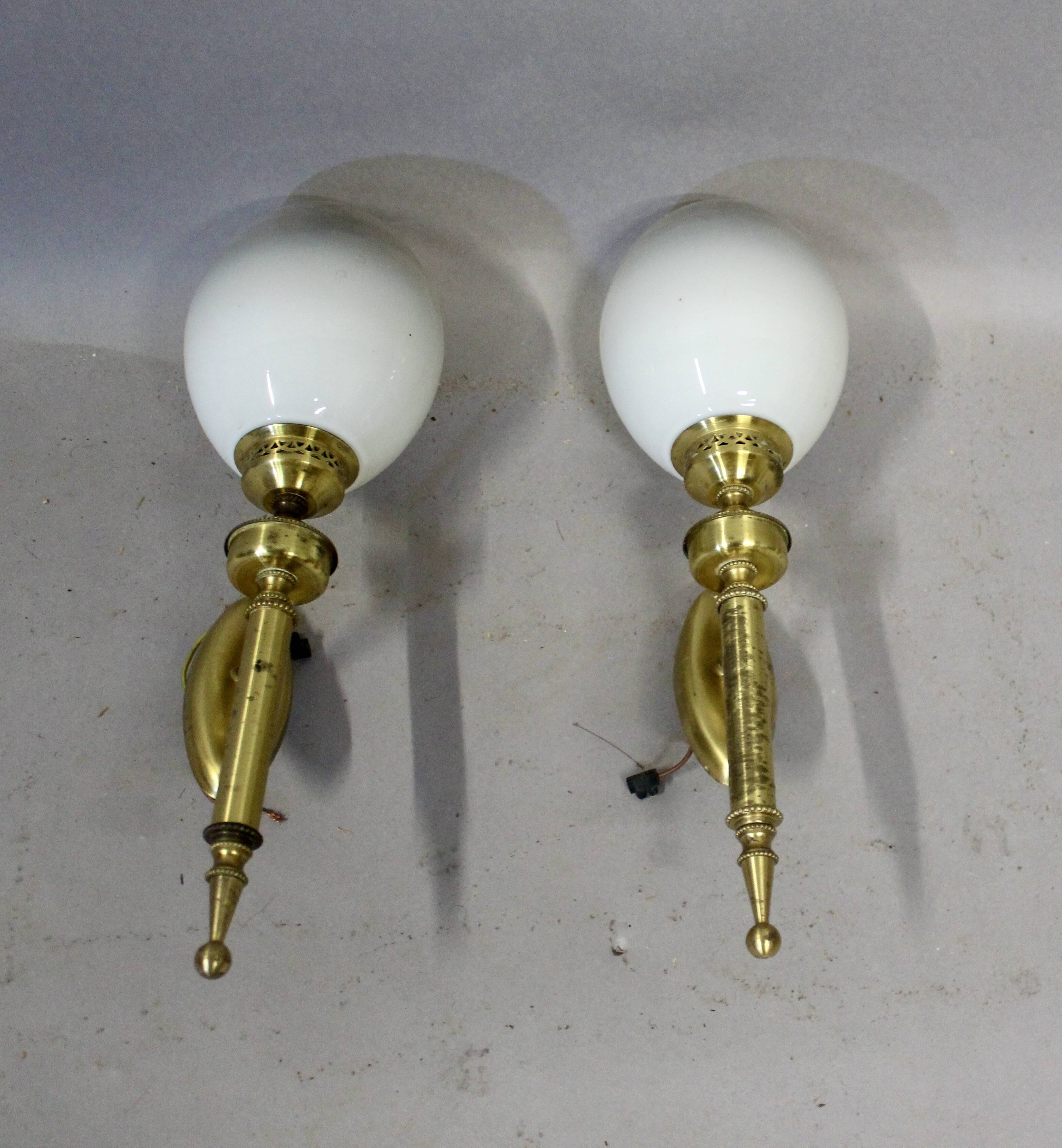 Pair of brass torchiere-style wall lights