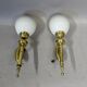 Pair of brass torchiere-style wall lights