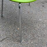 Fluorescent green Scandinavian chair in curved wood and steel