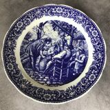 Blue enamelled earthenware wall dish with peasant scene decor Boch La Louvière