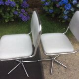 Vintage swivel chairs with chrome tubular base and silver skaï brand unic desing.
