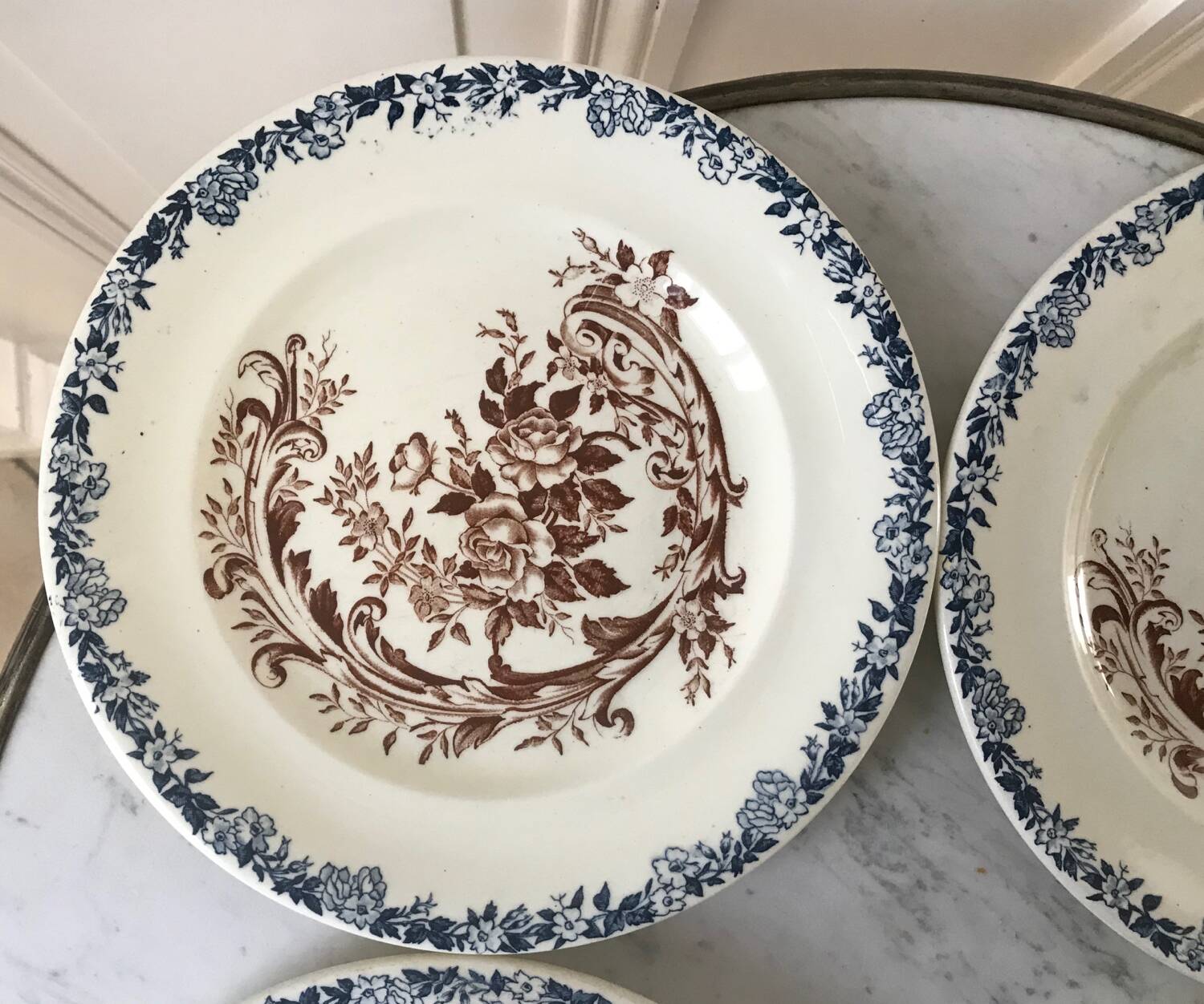 Set of 4 flat plates in Terre de Fer, Rocaille model, 19th century