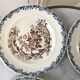 Set of 4 flat plates in Terre de Fer, Rocaille model, 19th century