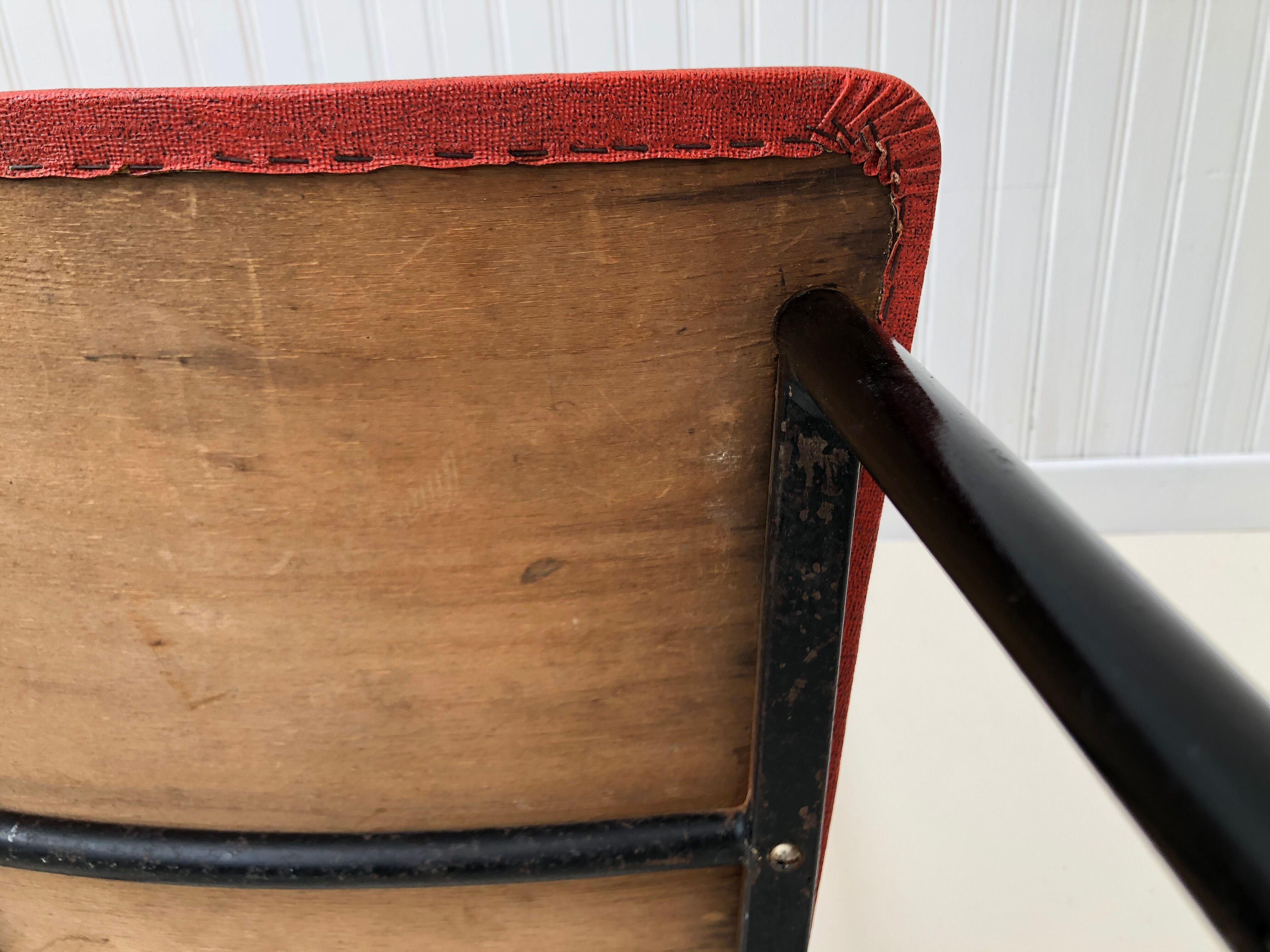 Red metal chairs from the 60s