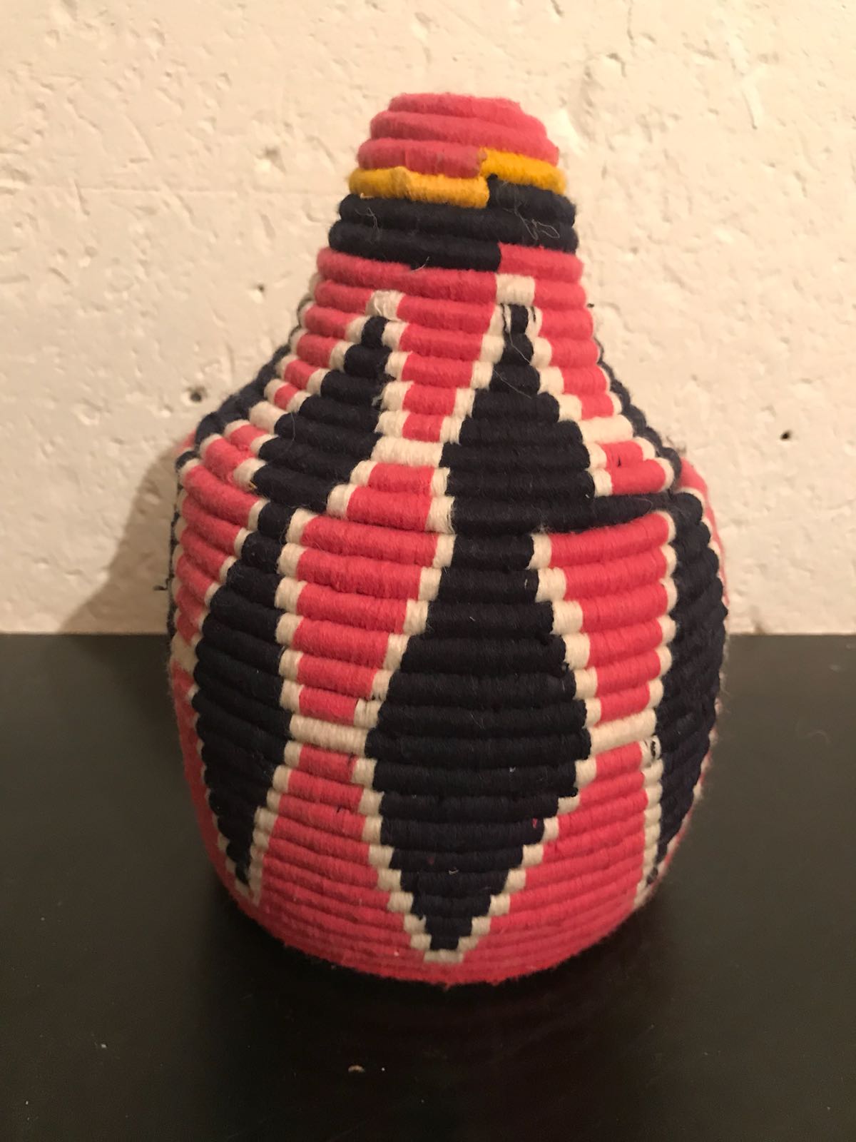 Berber wool and red and black raffia basket