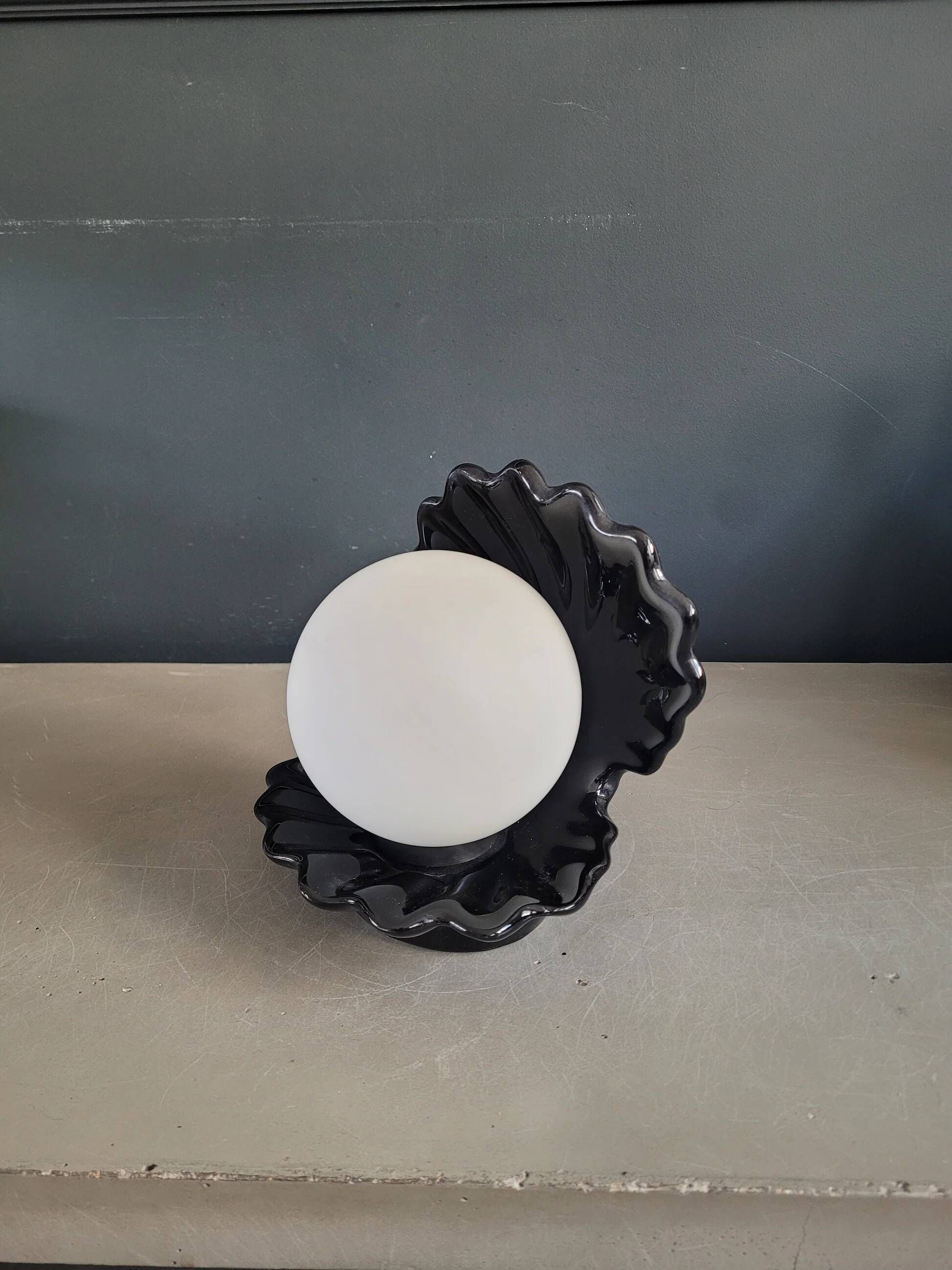 Vintage shell lamp in black porcelain with opaline globe.