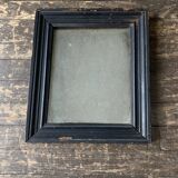 19th century blackened mirror with pitted glass 34cm x 40cm