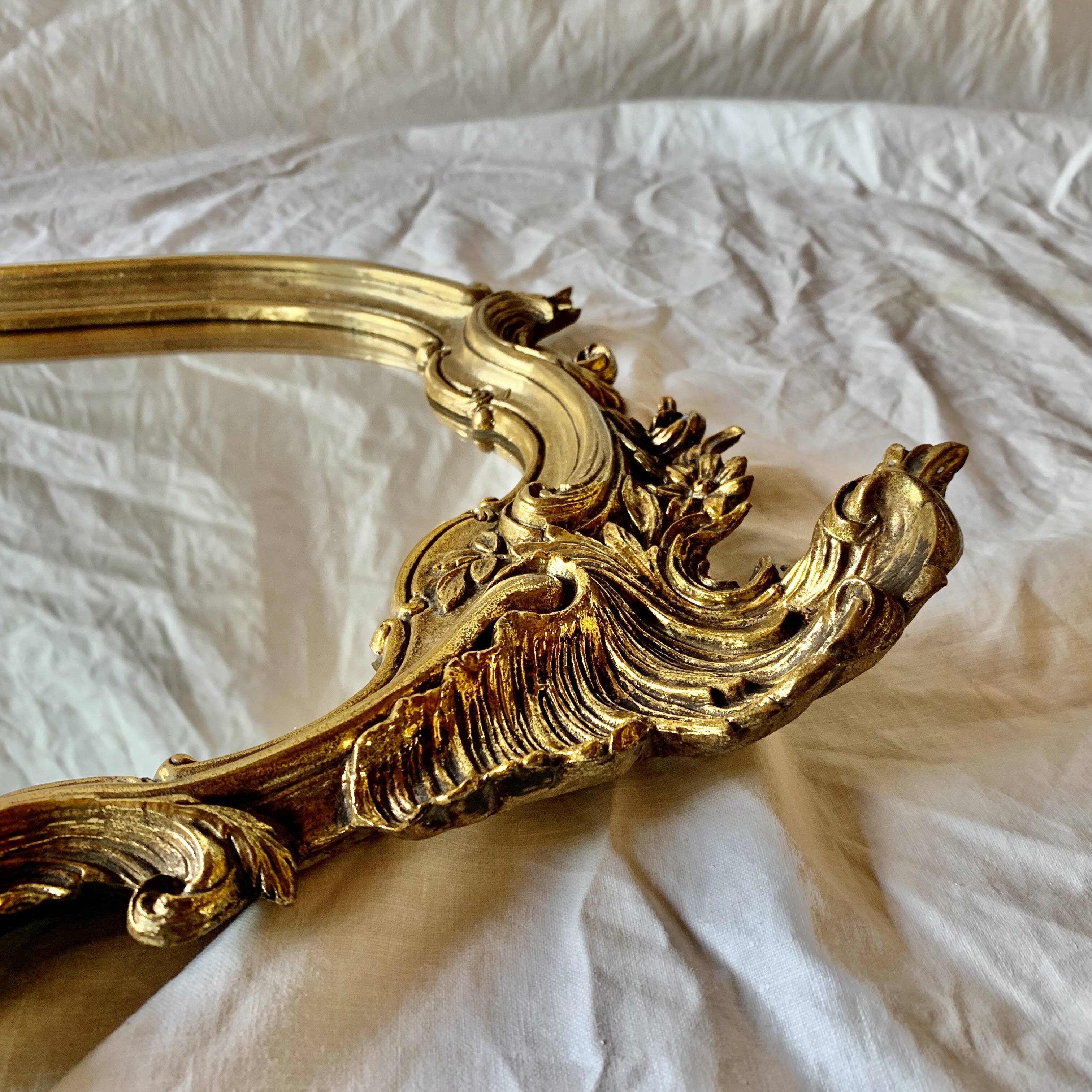 Old wall mirror in golden resin rococo style - made in france