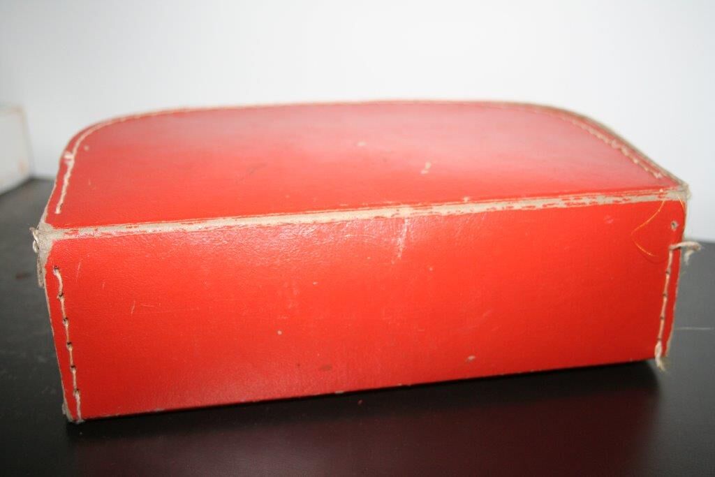 Small suitcase cardboard orange