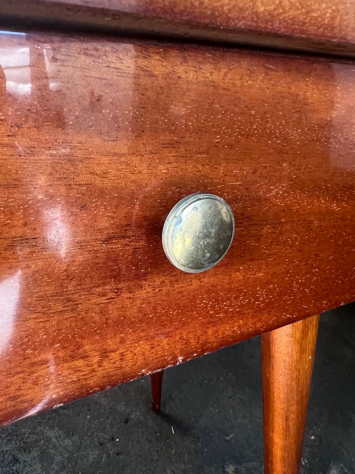 Pair of bedside or night tables in lacquered mahogany with compass feet