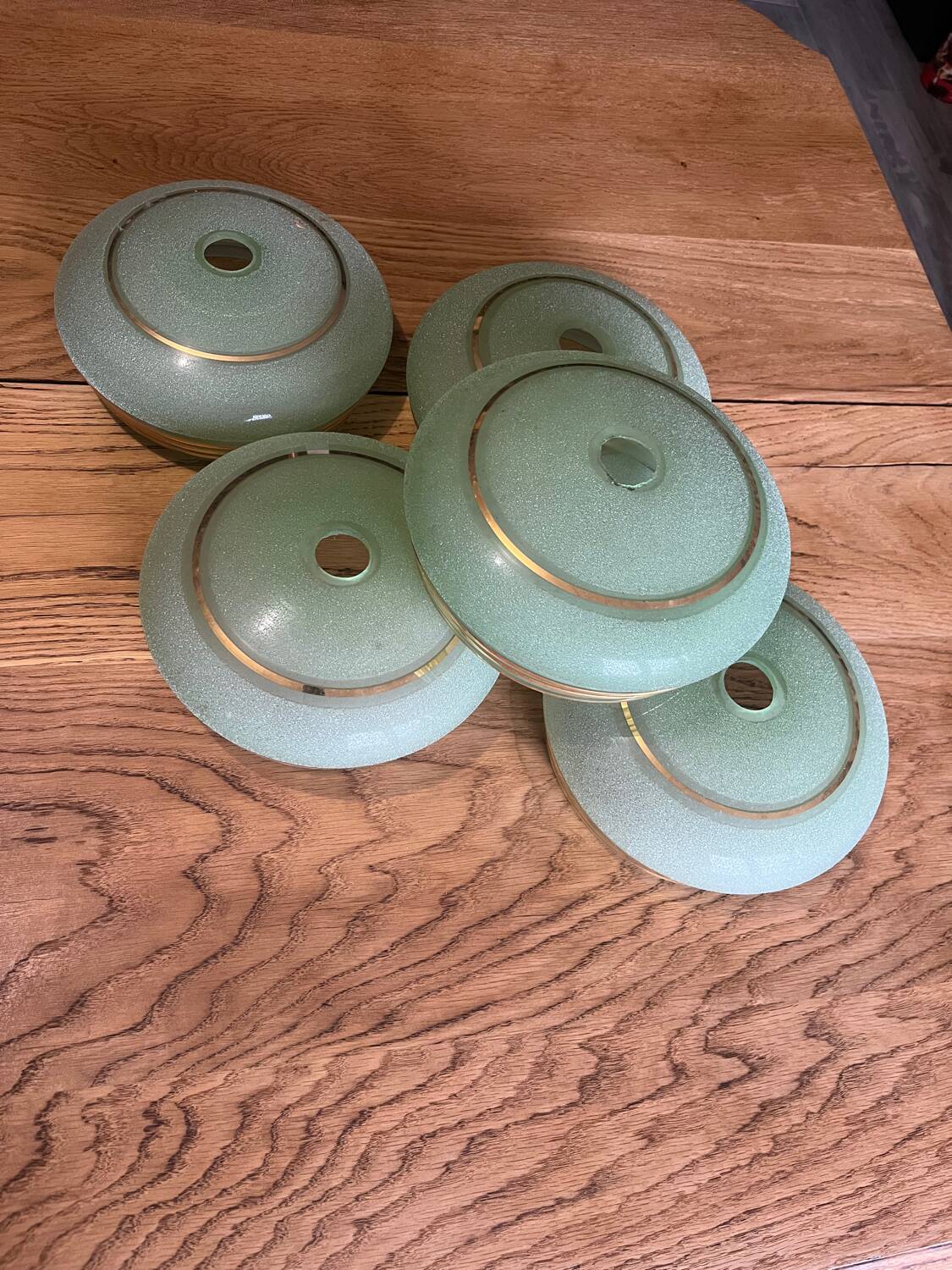 5 green and gold lamp glasses