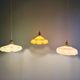 Trio of Art Deco pendant lights in colored opaline glass, 1930s