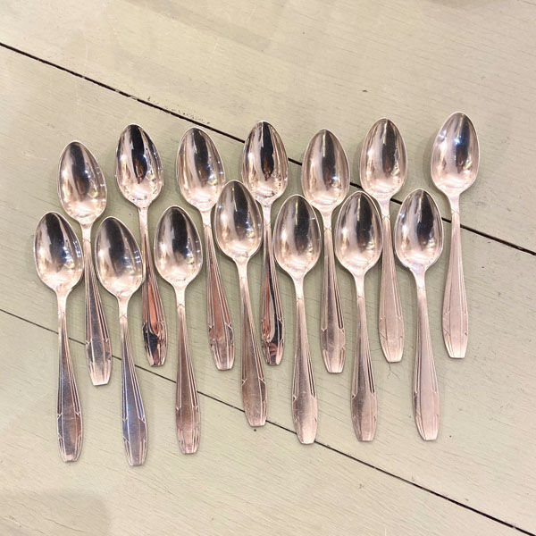 Series of 14 Art Deco dessert spoons, silver metal