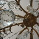 Chandelier 12 lamps with grapevines in crystal, bronze and regulated