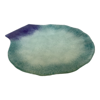Blue glass paste pocket emptier