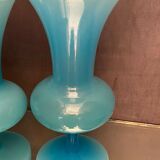 Two vases on a pedestal in blue opaline