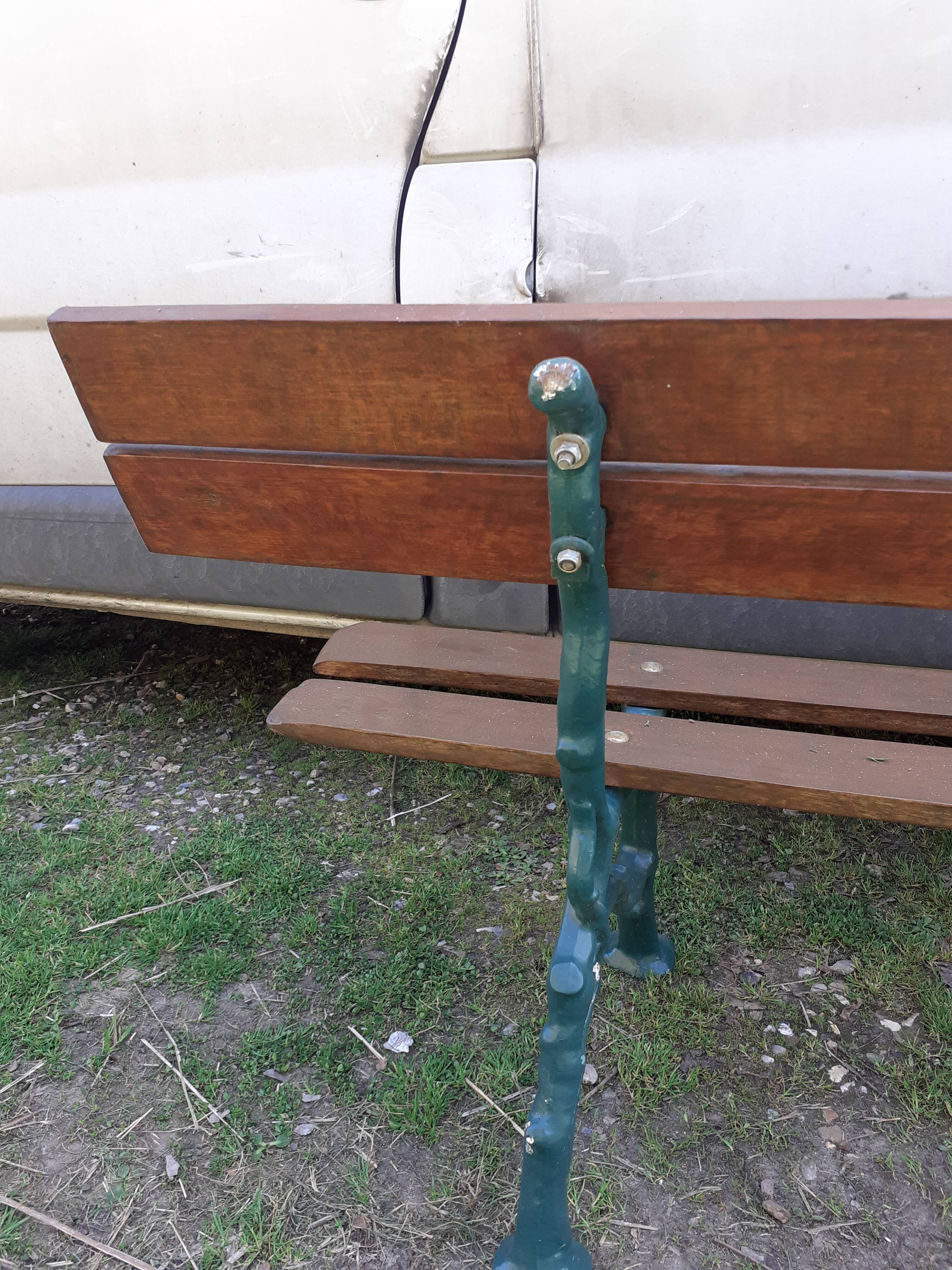 Old garden bench with cast iron feet
