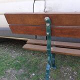 Old garden bench with cast iron feet
