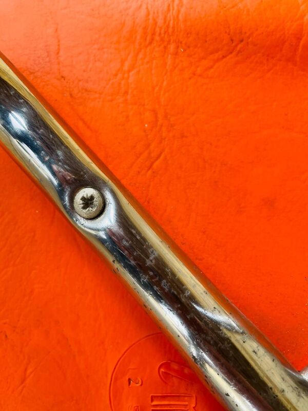 Tabouret vintage skaï orange et pieds chrome circa 70s