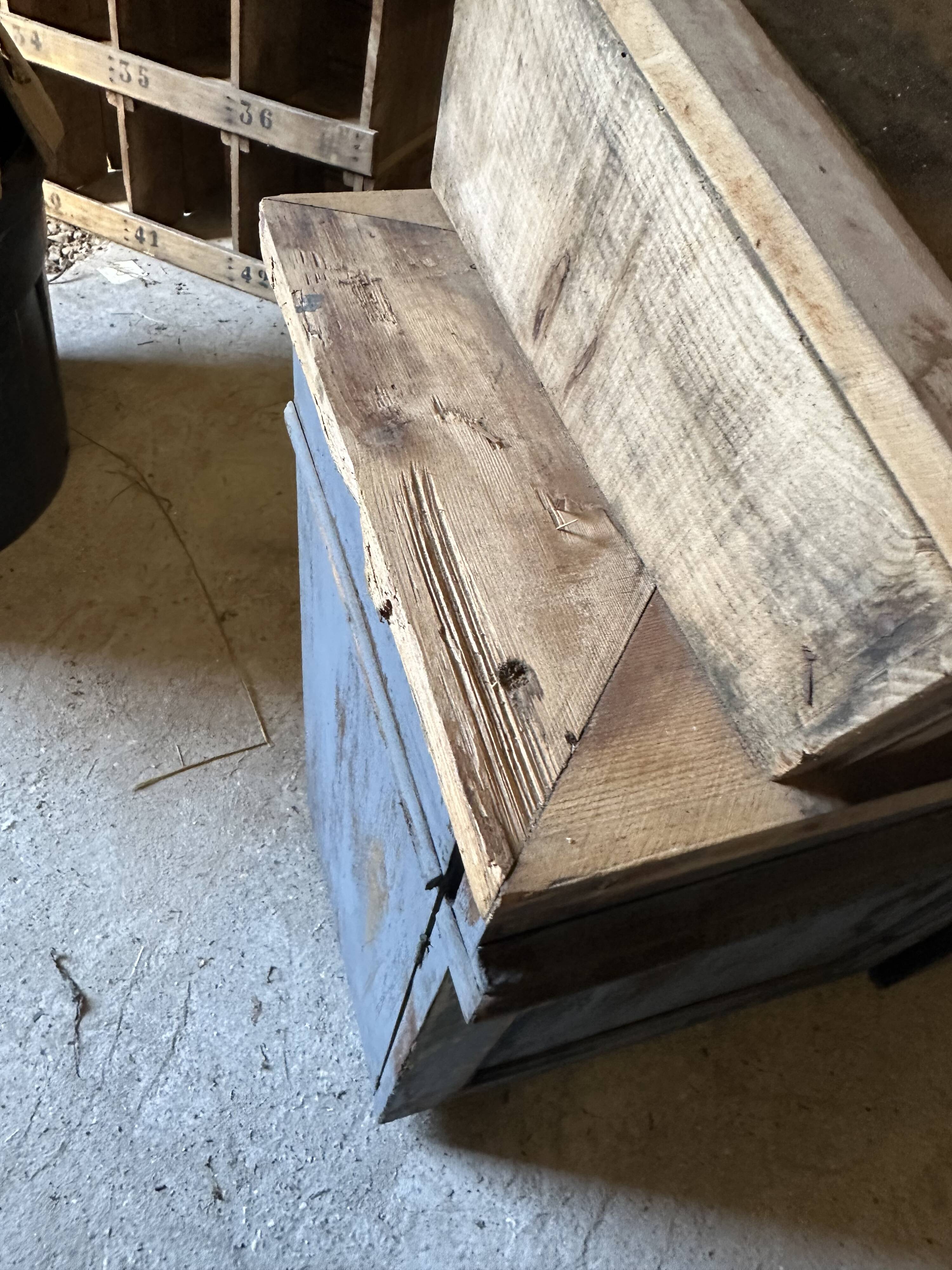 Showcase for boutique furniture, inclined boxes for presentation of collections on low sideboard