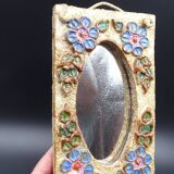 Flower-decorated sandstone mirror, circa 1970