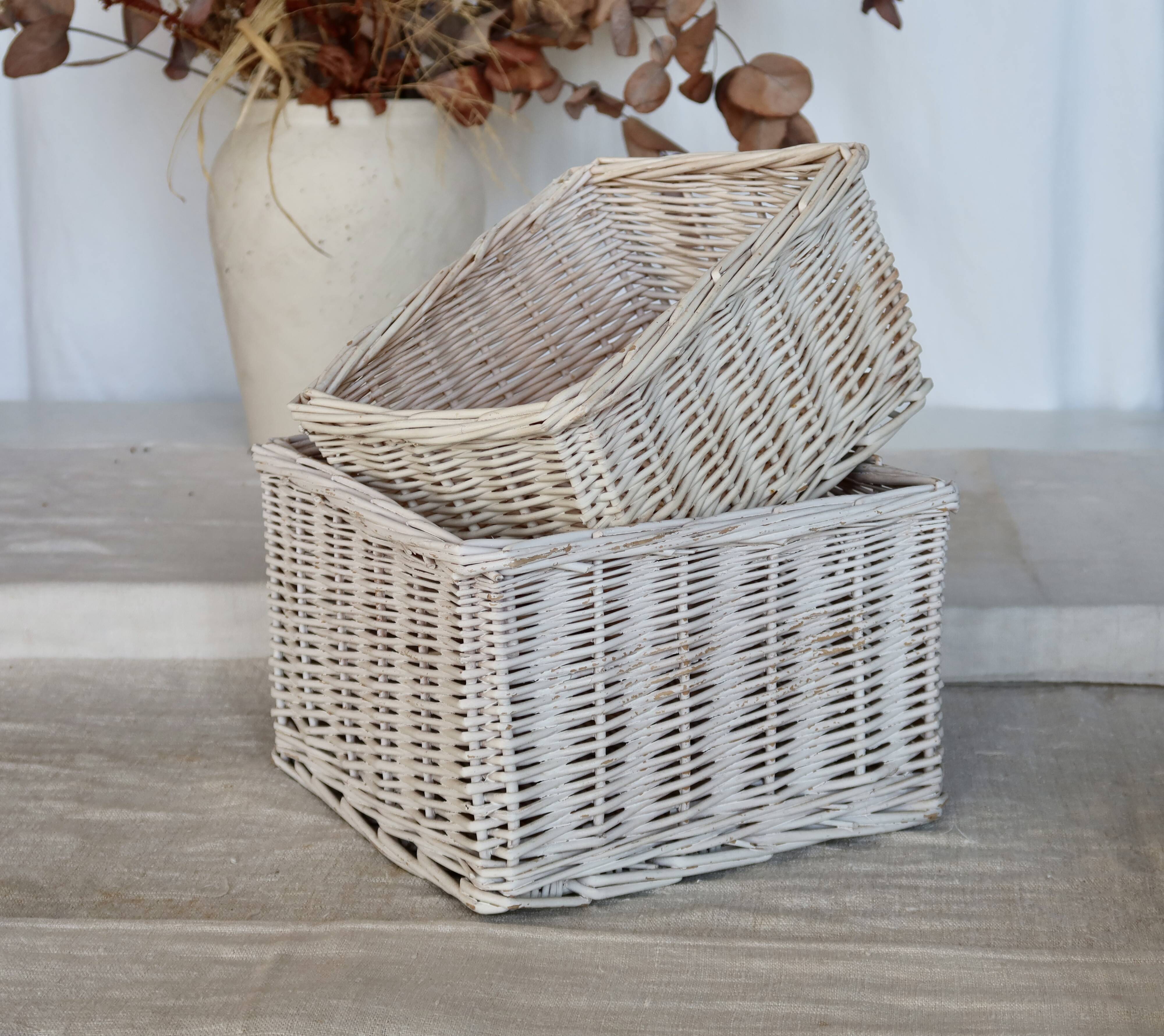 Vintage white wicker storage baskets