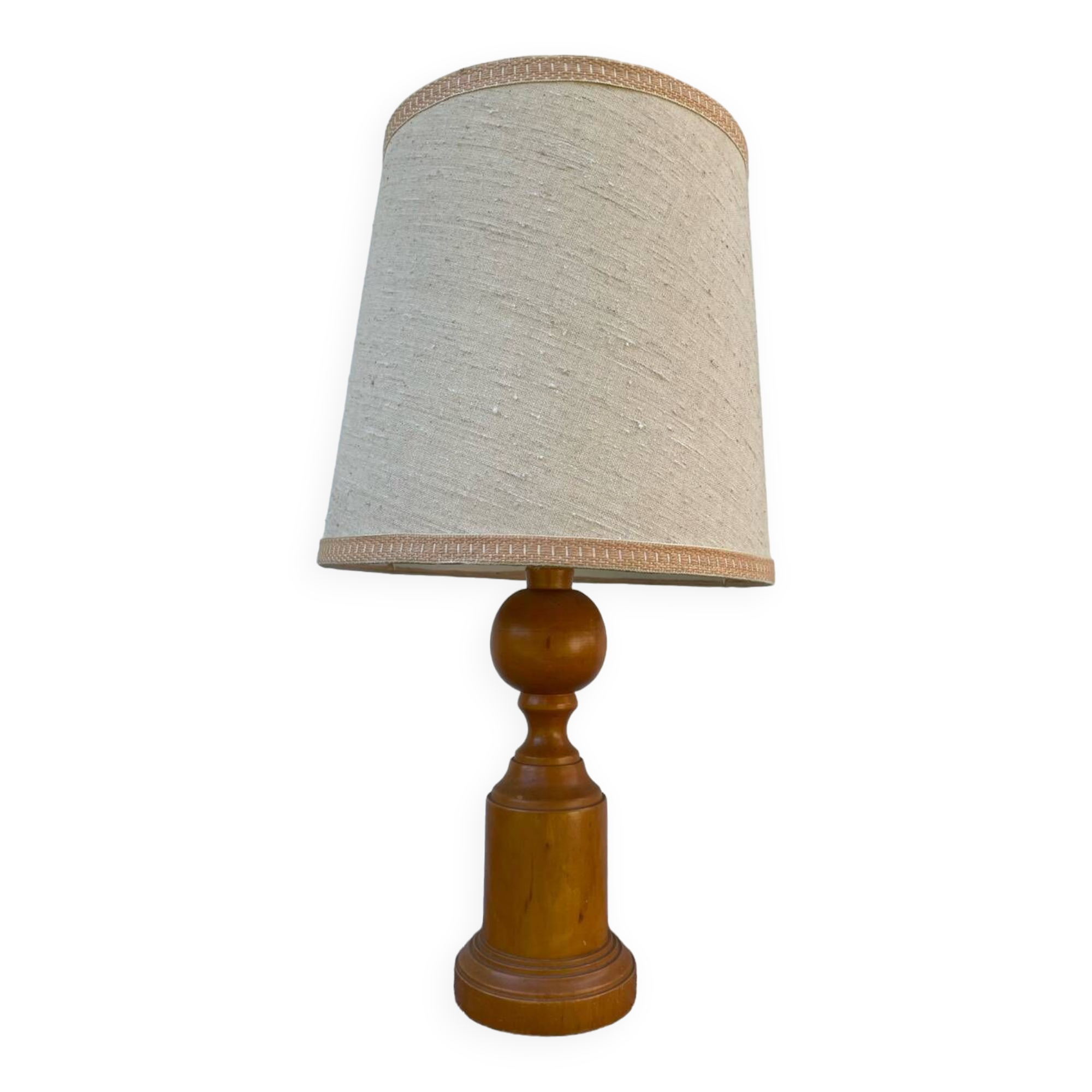 Old turned wooden lamp