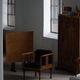 Early 20th century Danish Art Nouveau armchair, reupholstered in charcoal boucle.