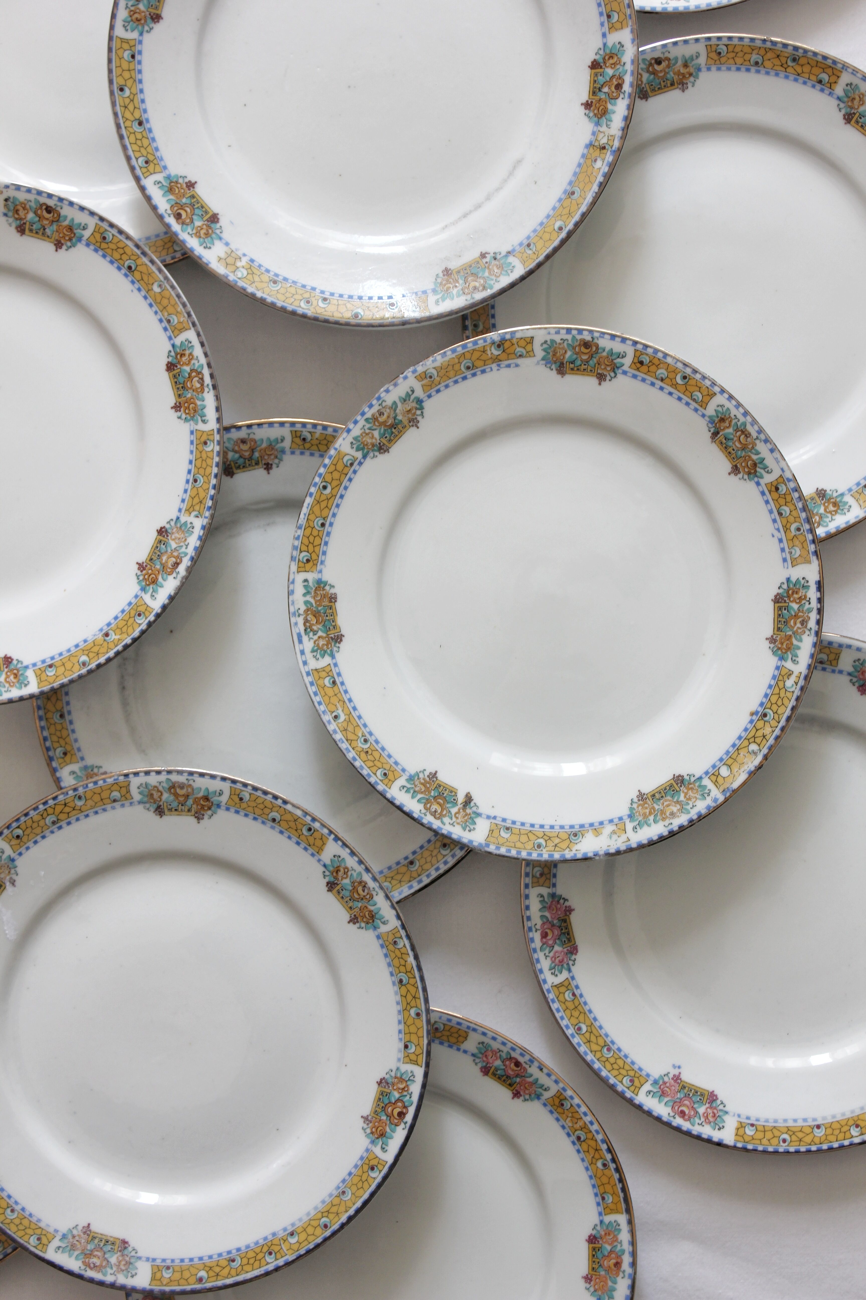 12 vintage porcelain dessert plates