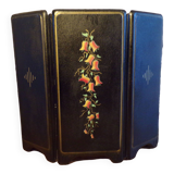 Old fireplace screen in painted sheet metal