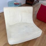 Two armchairs and a pop footstool from Roset