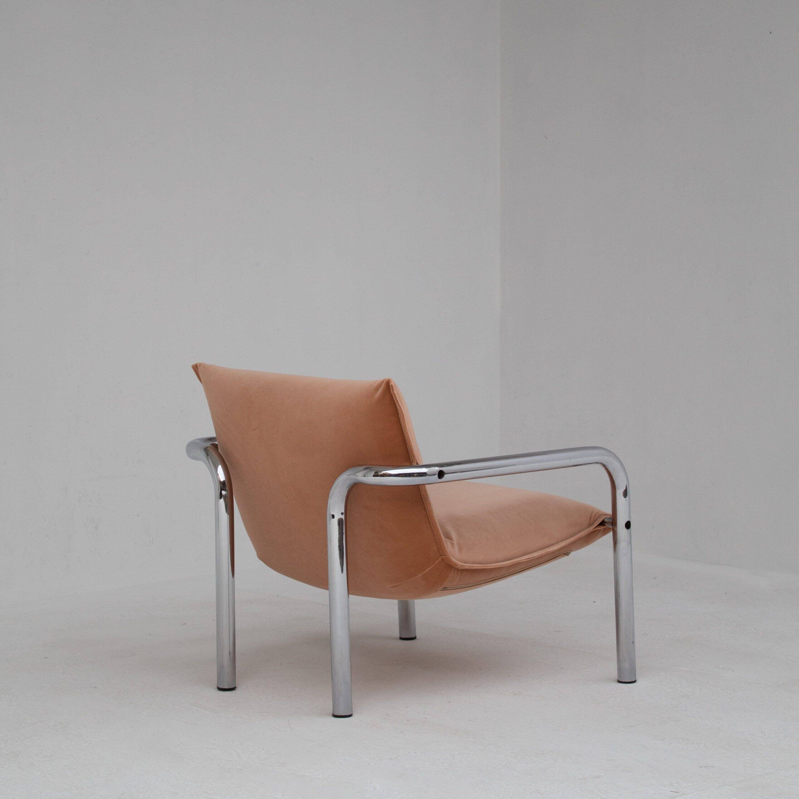 Pair of tubular armchairs in salmon velvet