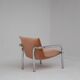 Pair of tubular armchairs in salmon velvet