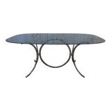 Contemporary glass and chrome dining table.