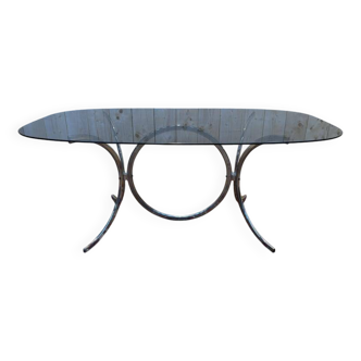 Contemporary glass and chrome dining table.