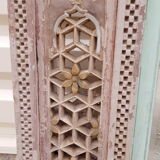 Fully hand-carved stone window with mirror