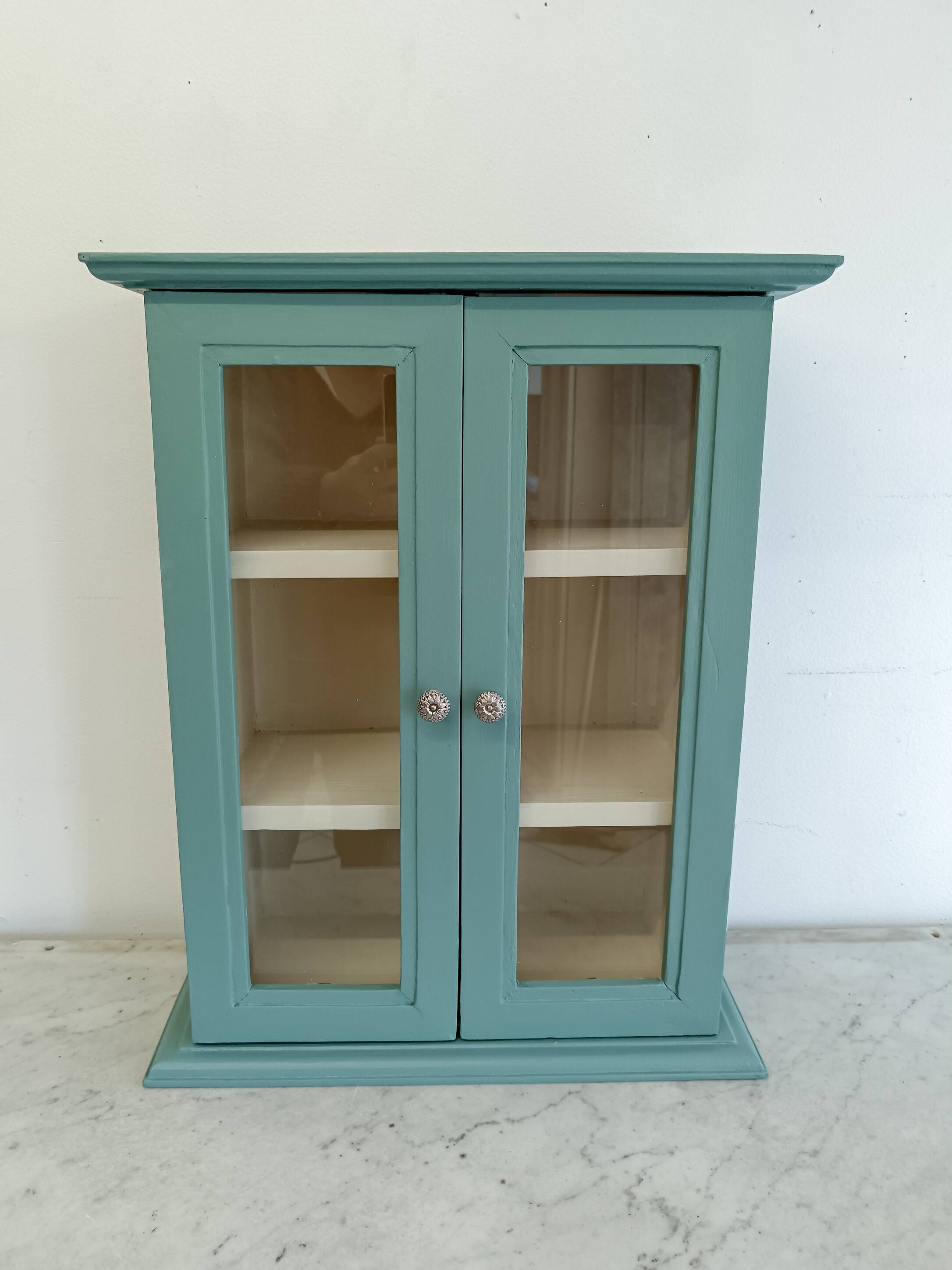 Green and beige 2-door wall display case