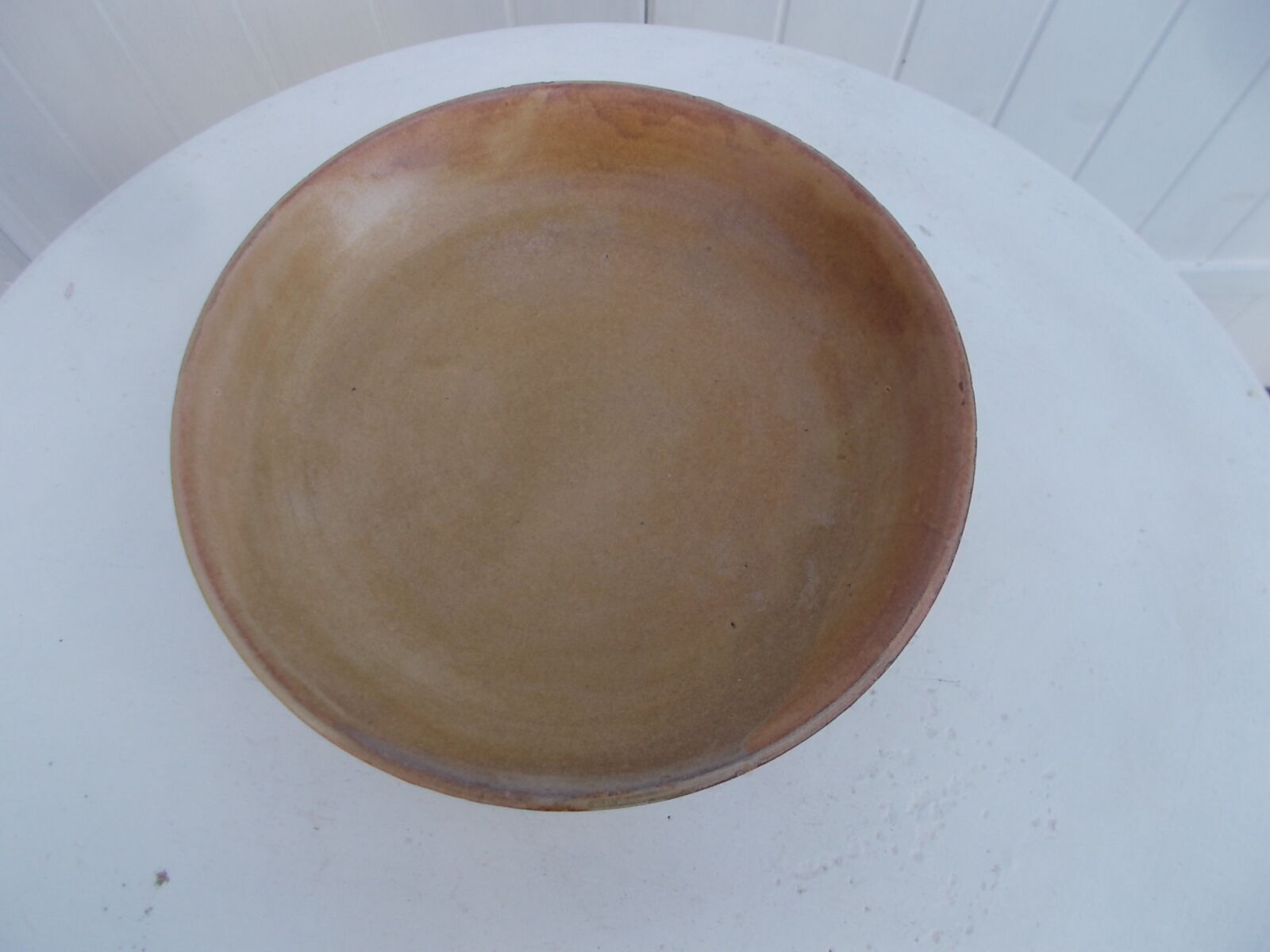 Stoneware serving dish for fruit.