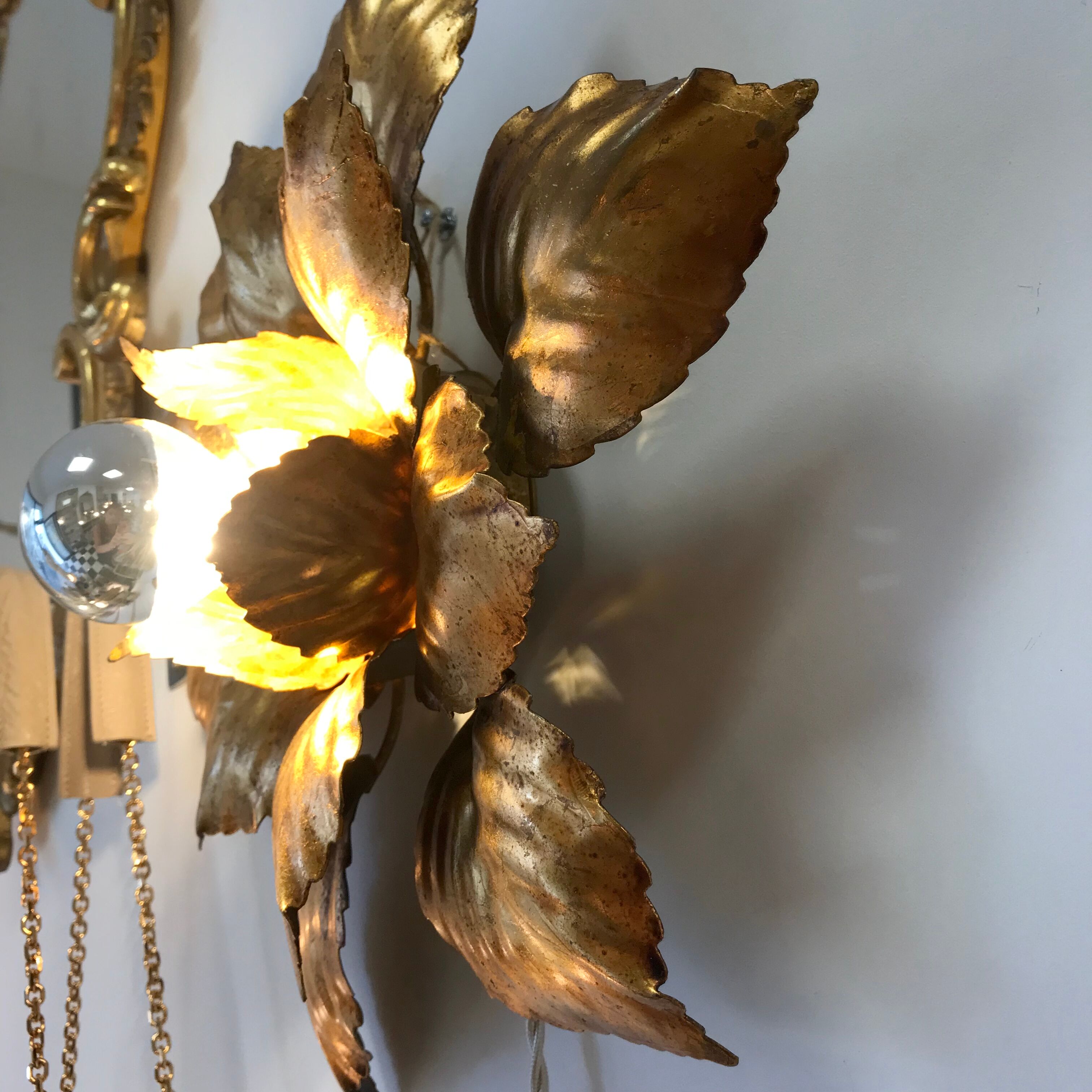 Wall light golden metal flower to leaf