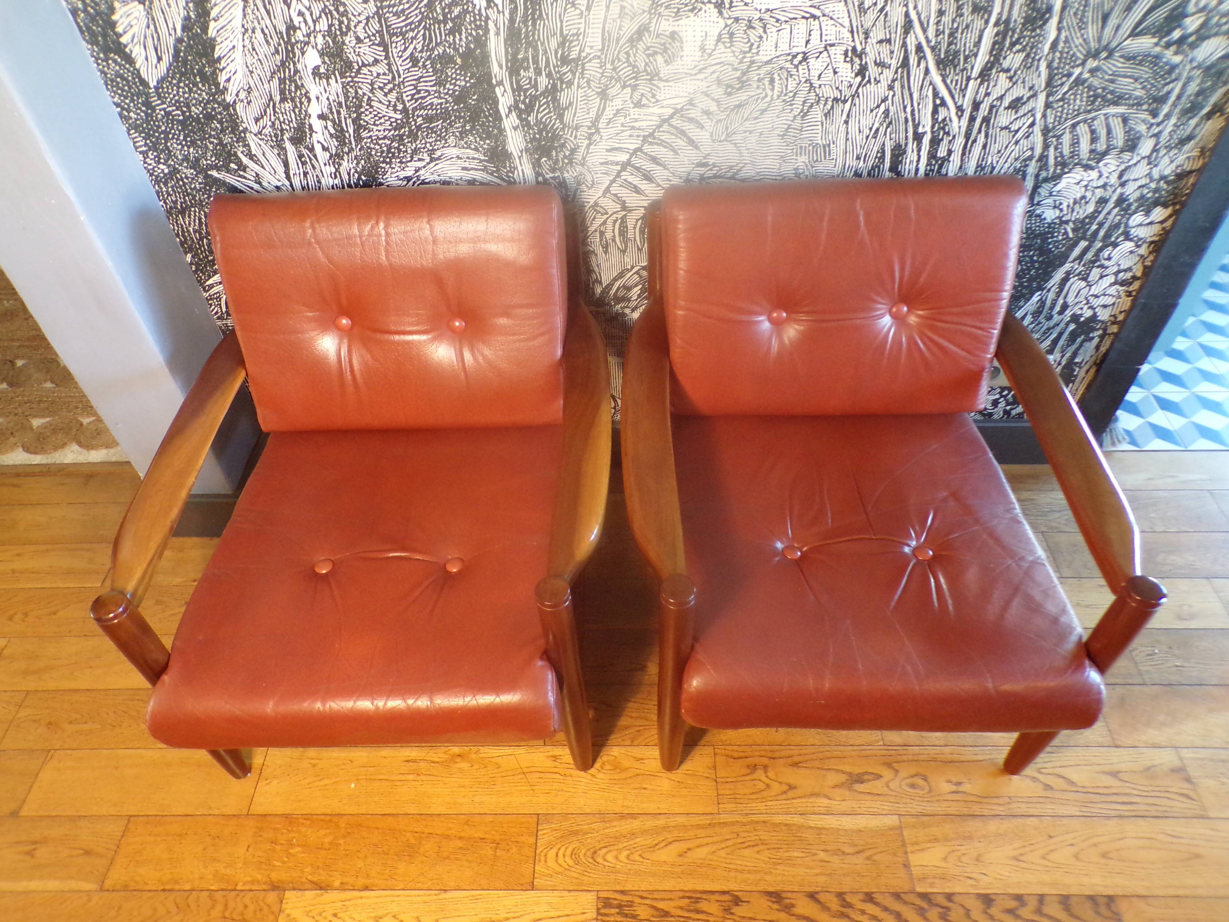 Pair of Scandinavian teak and leather armchairs