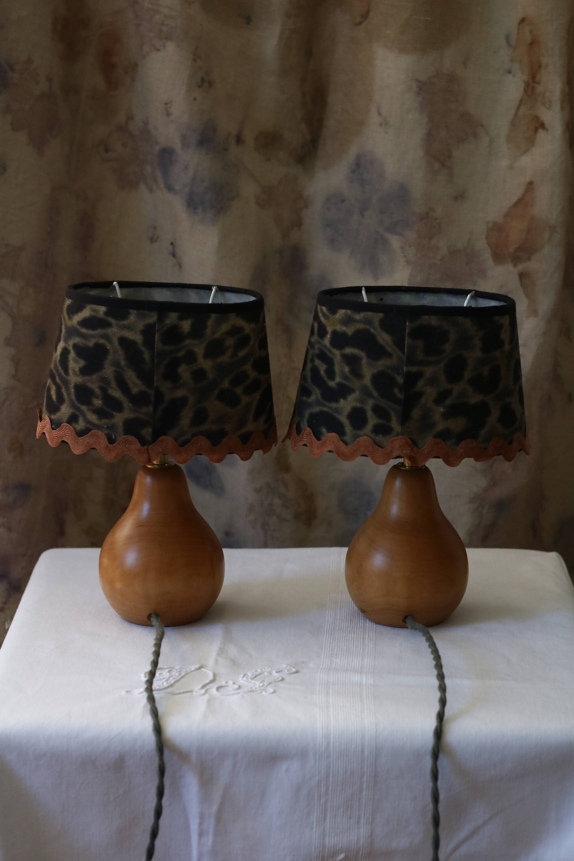 Pair of pear wood bedside lamps with leopard shades