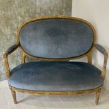 Banquette en bois doré sculpté et mouluré de style Louis XVI Époque XIX eme siècle