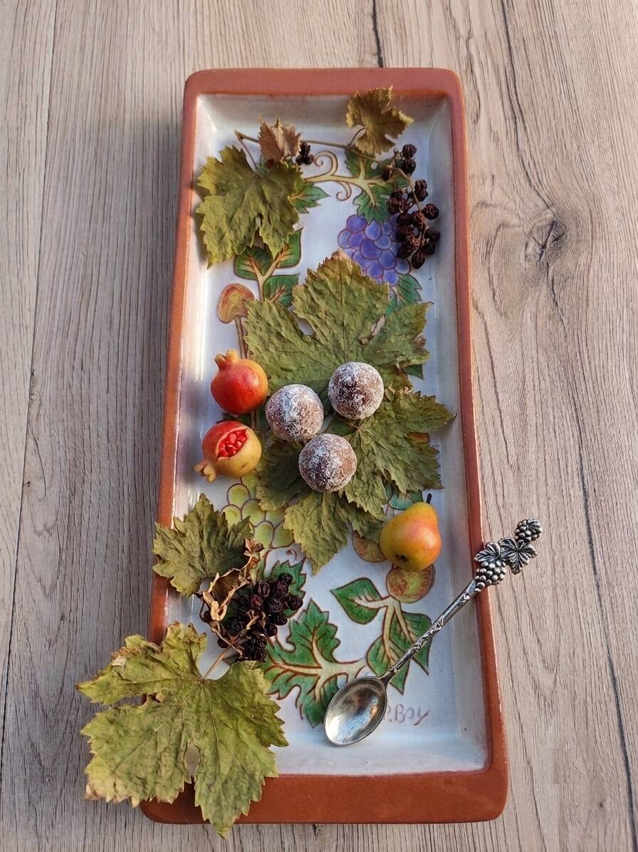 Terracotta plate signed P.Boy, glazed artisanal ceramics.
