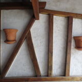 Pair of decorated terracotta wall flower pots