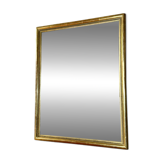 Antique beaded mirror with gold leaf